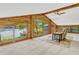 Striking lake views through expansive A-frame windows in this cozy loft space at 3359 Scarlet Dr, Sanford, FL 32773