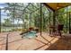 Screened-in pool featuring a waterfall and beautiful landscaping, perfect for outdoor relaxation and entertaining at 3359 Scarlet Dr, Sanford, FL 32773