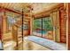 Sitting room with a spiral staircase and picturesque views of a waterfall outside the window at 3359 Scarlet Dr, Sanford, FL 32773
