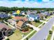 Attractive two-story home with lush landscaping, a paved driveway, and a well-maintained lawn in a desirable neighborhood at 5062 Otters Den Trl, Sanford, FL 32771
