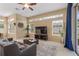 Inviting living room featuring high ceilings, ample natural light, and stylish decor at 5062 Otters Den Trl, Sanford, FL 32771