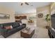 Cozy living room with an adjacent dining area and kitchen, perfect for entertaining and everyday living at 5062 Otters Den Trl, Sanford, FL 32771