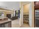 Walk-in pantry offers ample storage space with adjustable shelving and easy access from the kitchen at 5062 Otters Den Trl, Sanford, FL 32771