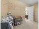 Spacious walk-in closet with ample shelving and storage for organized and convenient wardrobe management at 5062 Otters Den Trl, Sanford, FL 32771