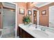 Bathroom with dual sinks, and a shower/tub combo at 613 Crownclover Ave, Orlando, FL 32828
