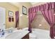 Bathroom featuring a tub, shower with curtain, and neutral color scheme at 613 Crownclover Ave, Orlando, FL 32828