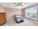 Cozy bedroom featuring a bed, large window with lots of natural light at 613 Crownclover Ave, Orlando, FL 32828