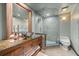 Well-appointed bathroom with a glass shower, artistic vanity, and modern fixtures at 613 Lake Ave, Altamonte Springs, FL 32701