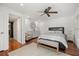Comfortable bedroom with a ceiling fan, ample space, and neutral tones creating a relaxing atmosphere at 613 Lake Ave, Altamonte Springs, FL 32701