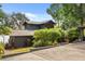 Unique home featuring modern architecture complemented by a lush garden landscape at 613 Lake Ave, Altamonte Springs, FL 32701