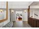 Inviting foyer with bench seating, dark wood accents, and stylish decor at 613 Lake Ave, Altamonte Springs, FL 32701