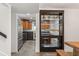 Stylish kitchen leads to a dining area, perfect for entertaining at 613 Lake Ave, Altamonte Springs, FL 32701