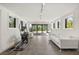 Spacious living room area with sleek furniture and large windows that provide ample natural light at 613 Lake Ave, Altamonte Springs, FL 32701