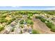 Aerial view of a neighborhood featuring tidy lawns, mature trees, and a mix of single-Gathering homes at 7025 Hiawassee Oak Dr, Orlando, FL 32818