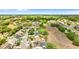 Aerial view of a neighborhood featuring tidy lawns, mature trees, and a mix of single-Gathering homes at 7025 Hiawassee Oak Dr, Orlando, FL 32818
