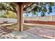 Spacious backyard with a mature tree, swing set, and privacy fence, perfect for outdoor living at 709 Strihal Loop, Oakland, FL 34787