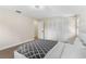Spacious bedroom boasts wood floors, and closet space, with a clean and inviting space at 7470 Lake Marsha Dr, Orlando, FL 32819