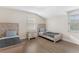 Bedroom featuring two beds, wood floors, and natural light, perfect for children or guests at 7470 Lake Marsha Dr, Orlando, FL 32819