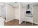Spacious walk-in closet with built-in shelving and a view of the adjacent shower at 7470 Lake Marsha Dr, Orlando, FL 32819