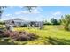 Expansive backyard featuring a rustic setting for outdoor relaxation and enjoyment at 8218 Pine Island Rd, Clermont, FL 34711