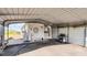 Attached covered carport offering convenient access and protection from the elements at 8218 Pine Island Rd, Clermont, FL 34711