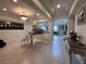 This foyer features tile floors, high ceilings, and unique architectural details at 8405 Adalina Pl, Orlando, FL 32827