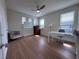 Bright office space with hardwood floors, ample natural light, and a neutral color palette at 8405 Adalina Pl, Orlando, FL 32827