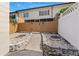 Private backyard area, features a garden pathway and a gated entrance at 8830 Sw 98Th Pl # M, Ocala, FL 34481