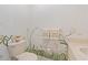 Charming half bathroom featuring floral-themed decor and modern fixtures at 8830 Sw 98Th Pl # M, Ocala, FL 34481