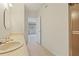 Bright bathroom leads to bedroom at 8830 Sw 98Th Pl # M, Ocala, FL 34481