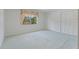 Bright bedroom with large window and closet space offers a serene retreat at 8830 Sw 98Th Pl # M, Ocala, FL 34481