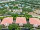Aerial view of residences amidst trees, displaying a well-planned community layout with ample green space at 918 Lotus Vista Dr # 102, Altamonte Springs, FL 32714