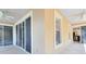 Covered balcony with sliding glass door access showcases indoor-outdoor living perfect for dining and entertaining at 918 Lotus Vista Dr # 102, Altamonte Springs, FL 32714