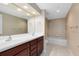 Bathroom features a double sink vanity and a shower over tub at 918 Lotus Vista Dr # 102, Altamonte Springs, FL 32714