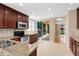 Well-equipped kitchen with granite countertops, stainless steel appliances, and a breakfast bar at 918 Lotus Vista Dr # 102, Altamonte Springs, FL 32714
