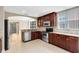 Modern kitchen features stainless steel appliances, granite countertops, and ample cabinet space at 918 Lotus Vista Dr # 102, Altamonte Springs, FL 32714