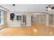 Open-concept living area with hardwood floors and seamless flow into the kitchen, perfect for entertaining at 918 Lotus Vista Dr # 102, Altamonte Springs, FL 32714