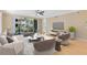 Bright living room with balcony access, hardwood floors, neutral tones, and comfortable seating arrangements at 918 Lotus Vista Dr # 102, Altamonte Springs, FL 32714