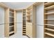 Custom walk-in closet with adjustable shelving and drawers, providing ample storage space at 918 Lotus Vista Dr # 102, Altamonte Springs, FL 32714
