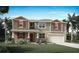 Inviting two-story home featuring a two-car garage, charming shutters, and a well-manicured lawn at 9256 Sea Pine Ave, Orlando, FL 32832