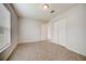 Neutral bedroom with closet and tile flooring featuring natural light from a large window at 927 Cambridge Ct, Kissimmee, FL 34758