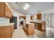 Spacious kitchen with granite counters, stainless appliances, and a large island at 927 Cambridge Ct, Kissimmee, FL 34758