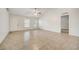 Bright living room with neutral walls, tiled flooring and an abundance of natural light at 927 Cambridge Ct, Kissimmee, FL 34758