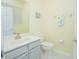 Clean bathroom with a single sink and gray vanity at 9635 Fenrose Ter, Orlando, FL 32827