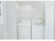 Convenient laundry room with a modern washer and dryer at 9635 Fenrose Ter, Orlando, FL 32827