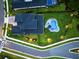 Overhead view of a home, highlighting the expansive backyard and beautiful swimming pool at 9877 Laurel Berry Dr, Orlando, FL 32827