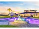 Beautiful backyard pool with spa and custom statue, perfect for outdoor relaxation and enjoyment at 9877 Laurel Berry Dr, Orlando, FL 32827