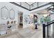 Spacious foyer with high ceilings, elegant decor, and plenty of natural light, creating a welcoming entrance at 9877 Laurel Berry Dr, Orlando, FL 32827