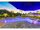Beautiful pool with a fun unicorn statue, lush landscaping, outdoor seating and a hot tub at 9877 Laurel Berry Dr, Orlando, FL 32827