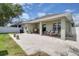 Charming backyard with a patio area, perfect for outdoor entertaining and relaxation at 9931 Cypress Knee Cir, Orlando, FL 32825